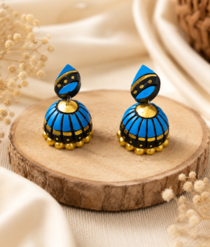 Pair of Azure Dome handmade terracotta jhumki earrings featuring hand-painted traditional clay dome designs in rich azure blue and metallic accents