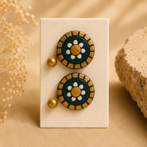 Handcrafted forest green terracotta jewellery set featuring orbit-inspired circular patterns with matching necklace and earrings