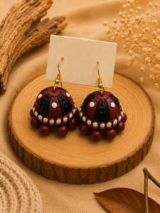 Handcrafted maroon terracotta dome jhumka hanging jewellery set with matching ethnic accessories