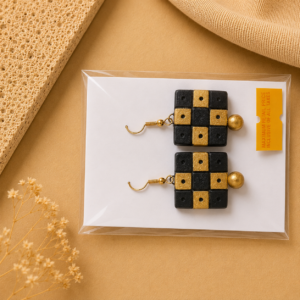 Handcrafted noir black checker-pattern terracotta jewellery set with matching earrings for festive and traditional wear.